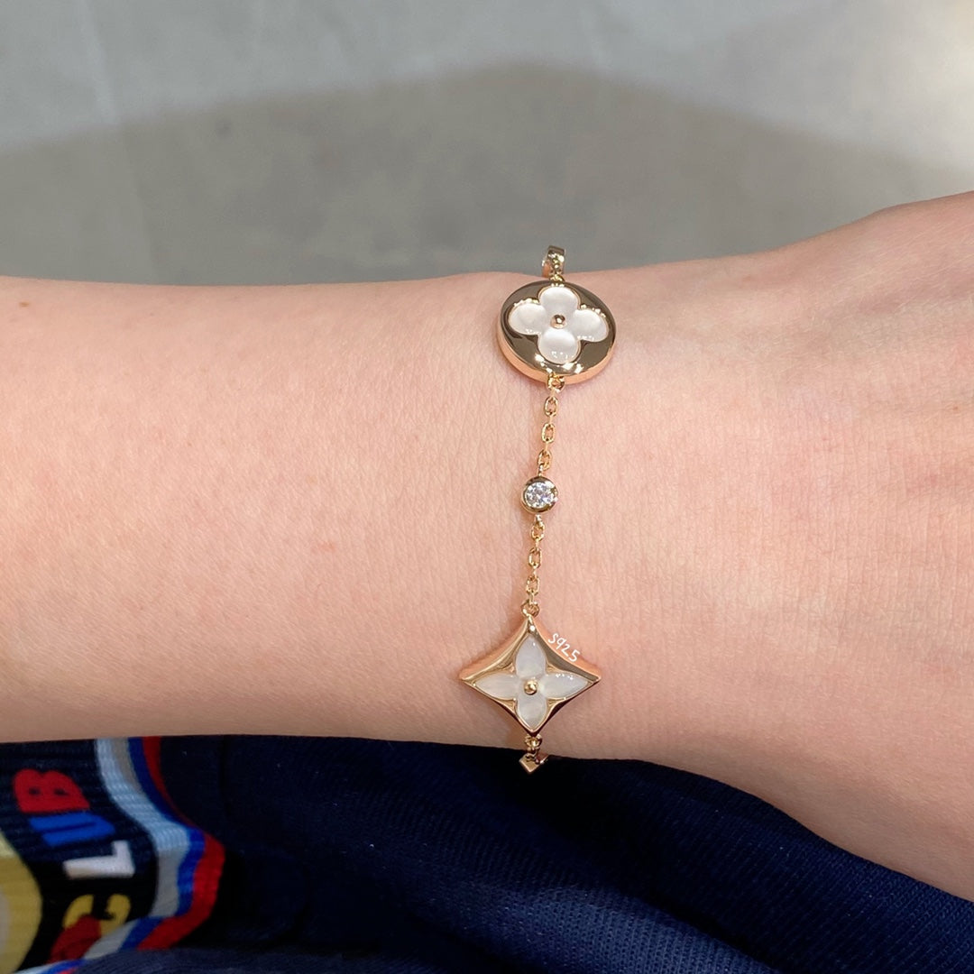 [Radiant Gem]¯STAR AND SUN 4 MOTIF WHITE MOP PINK GOLD BRACELET