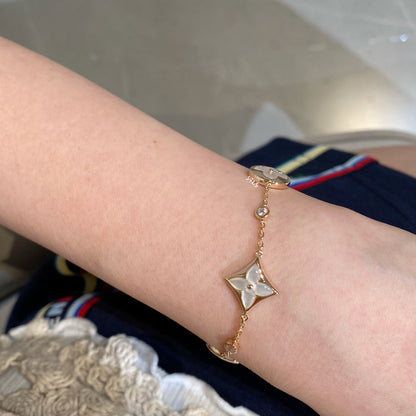 [Radiant Gem]¯STAR AND SUN 4 MOTIF WHITE MOP PINK GOLD BRACELET