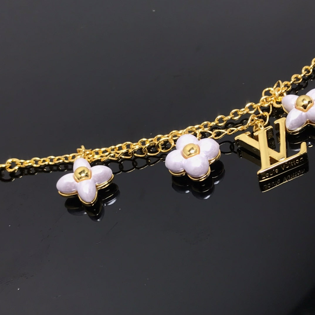 [Radiant Gem]¯LOGO 6 MOTIF STAR AND SUN GOLD BRACELET