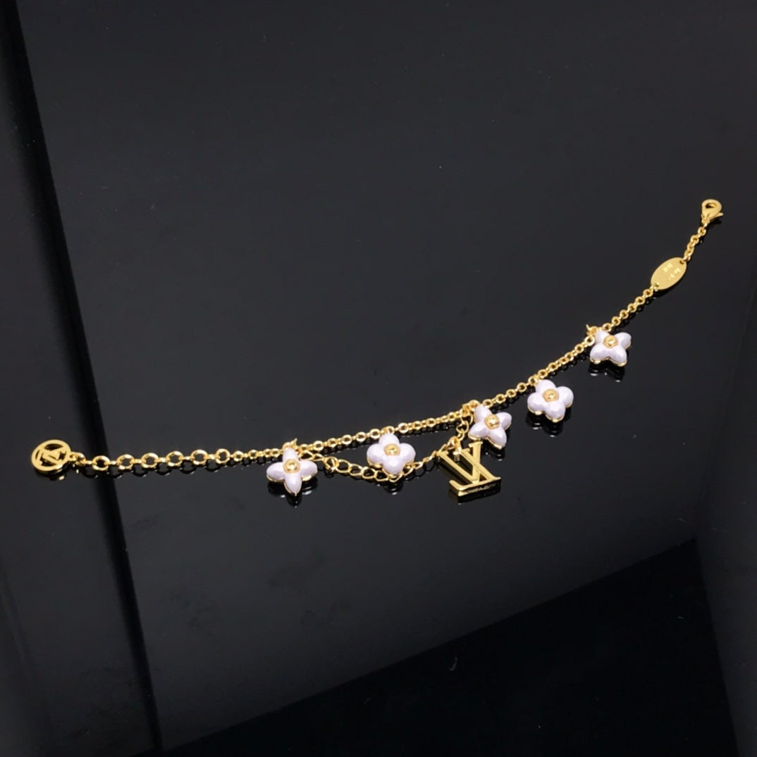 [Radiant Gem]¯LOGO 6 MOTIF STAR AND SUN GOLD BRACELET